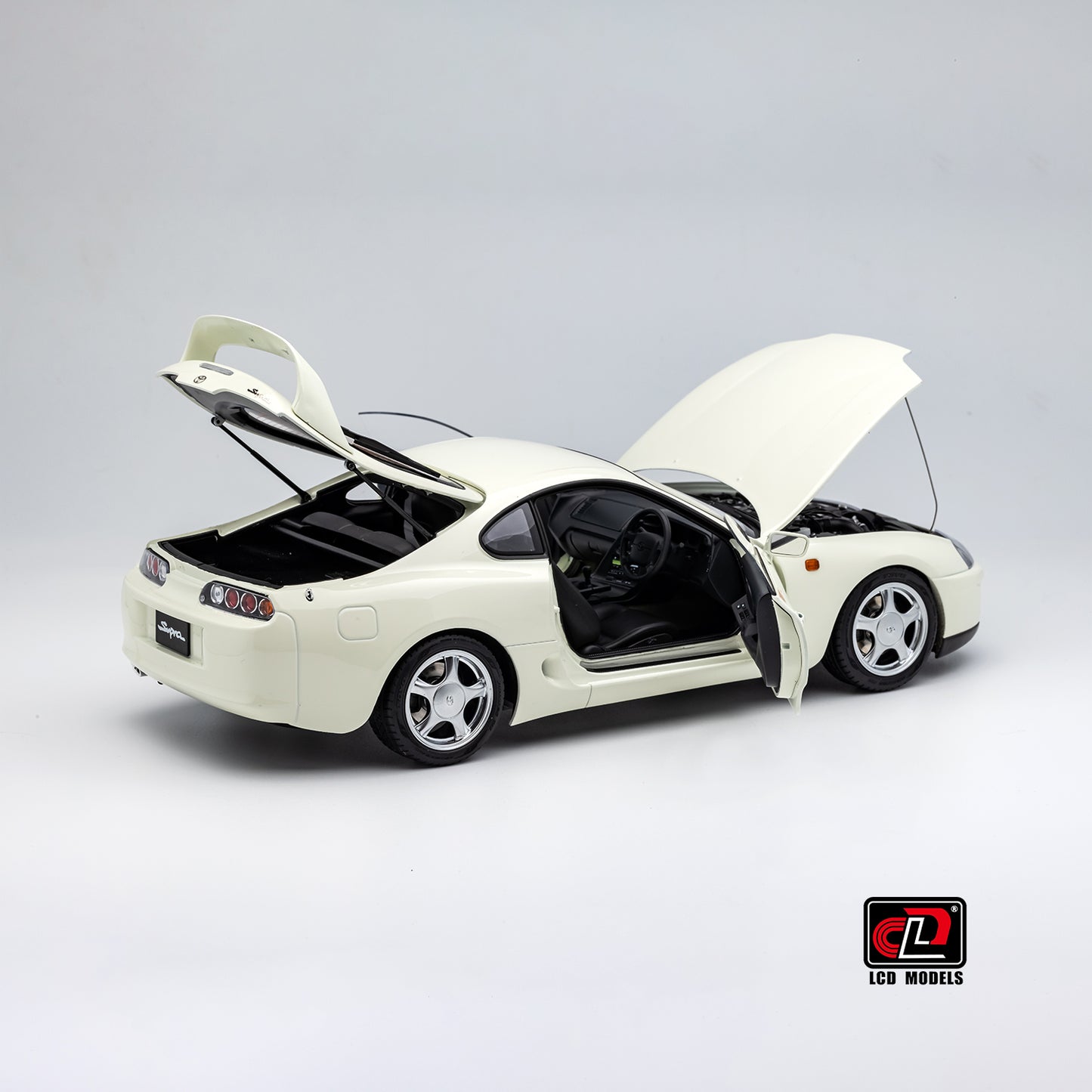 LCD Toyota Supra A80 (White color) *Comes with a lift!!* 1:18