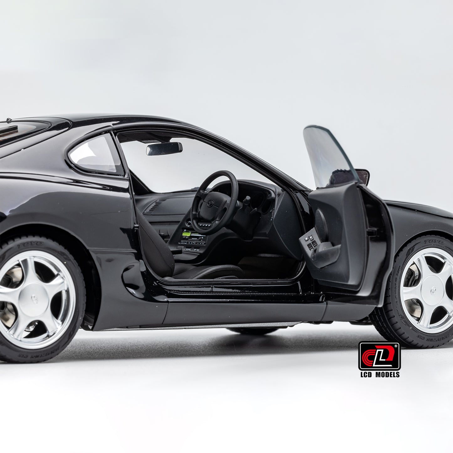 LCD Toyota Supra A80 (Black color) *Comes with a lift!!* 1:18