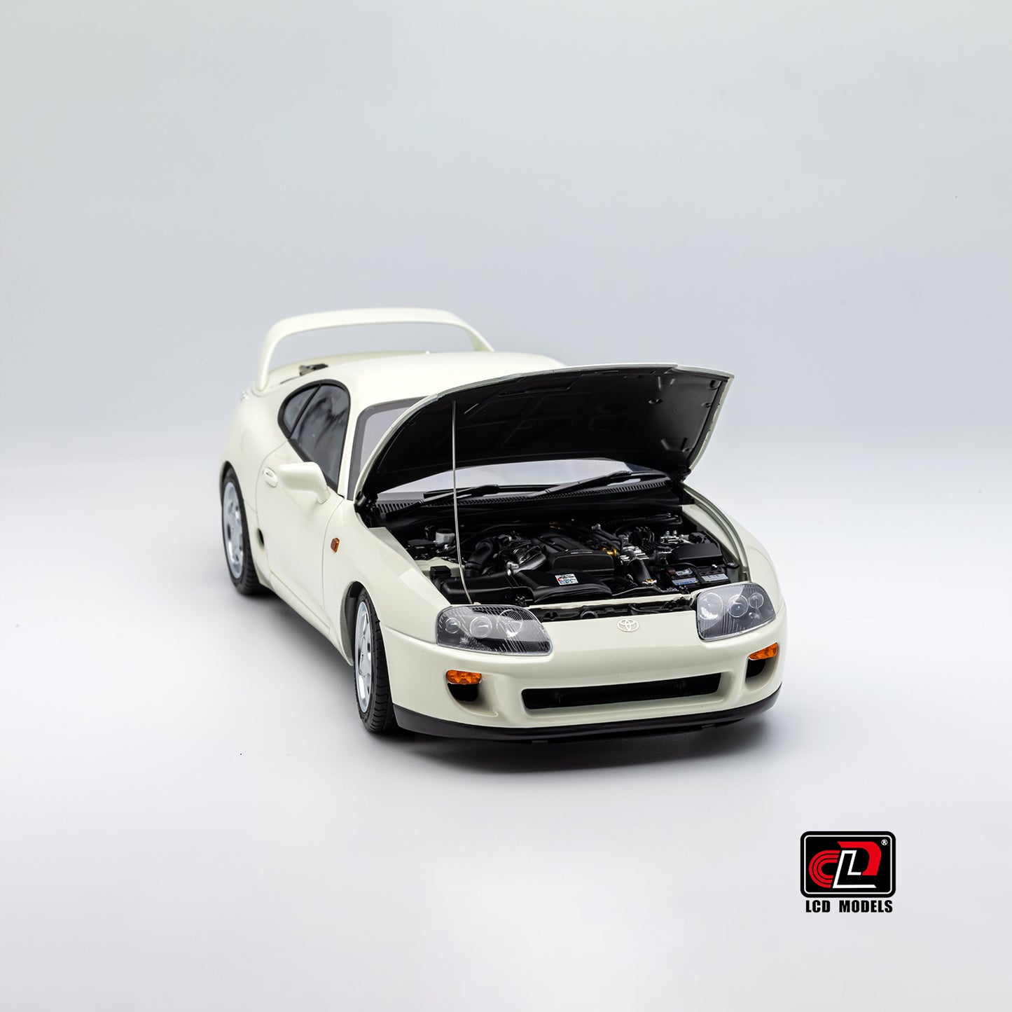 LCD Toyota Supra A80 (White color) *Comes with a lift!!* 1:18