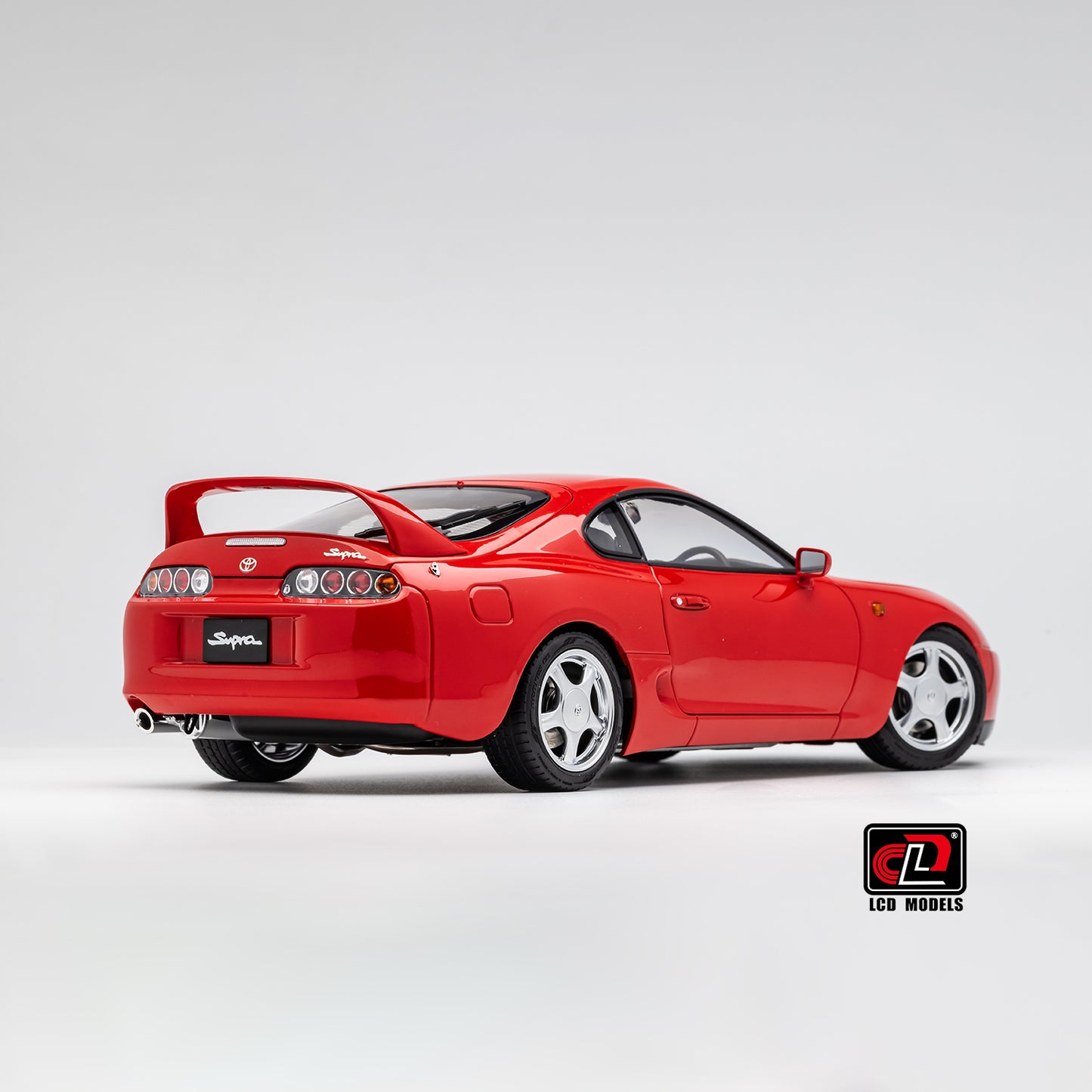 LCD Toyota Supra A80 (Red color) *Comes with a lift!!* 1:18