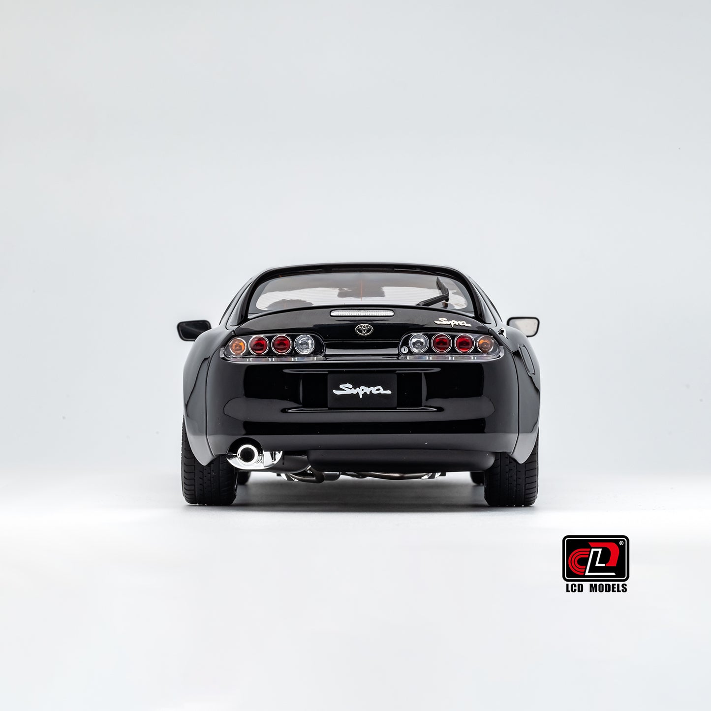 LCD Toyota Supra A80 (Black color) *Comes with a lift!!* 1:18