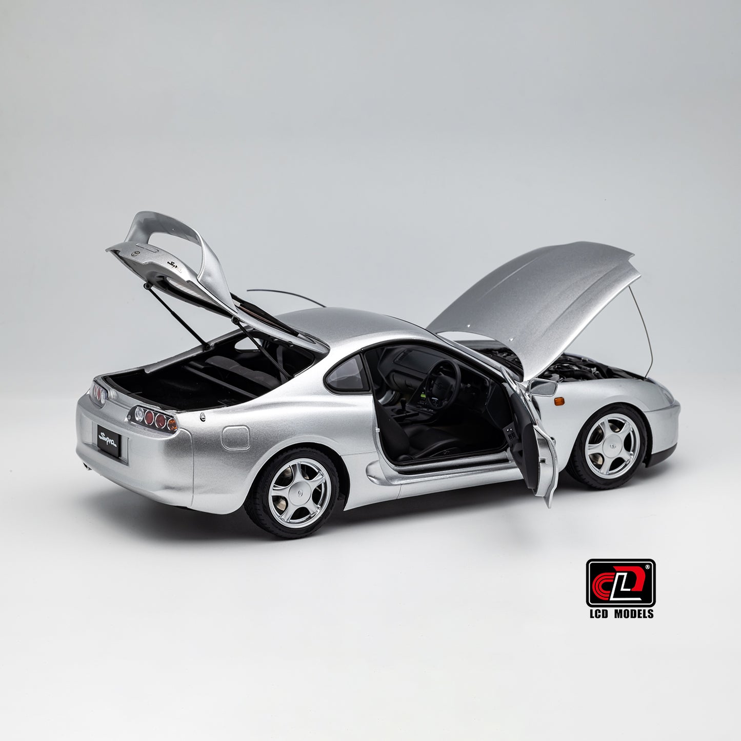 LCD Toyota Supra A80 (Silver color) *Comes with a lift!!* 1:18