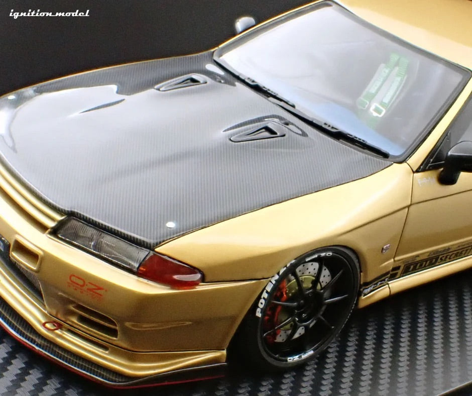 Ignition-Model Nissan Skyline GT-R R32 (VR32) Top Secret RHD Gold w/ Carbon Fiber Hood 1:18