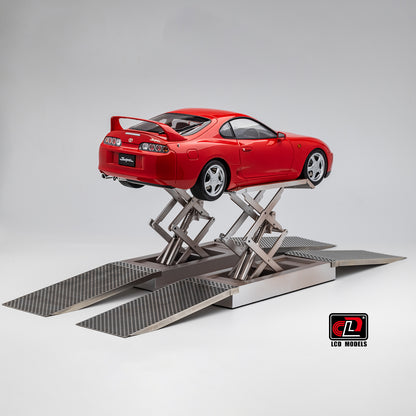 LCD Toyota Supra A80 (Red color) *Comes with a lift!!* 1:18