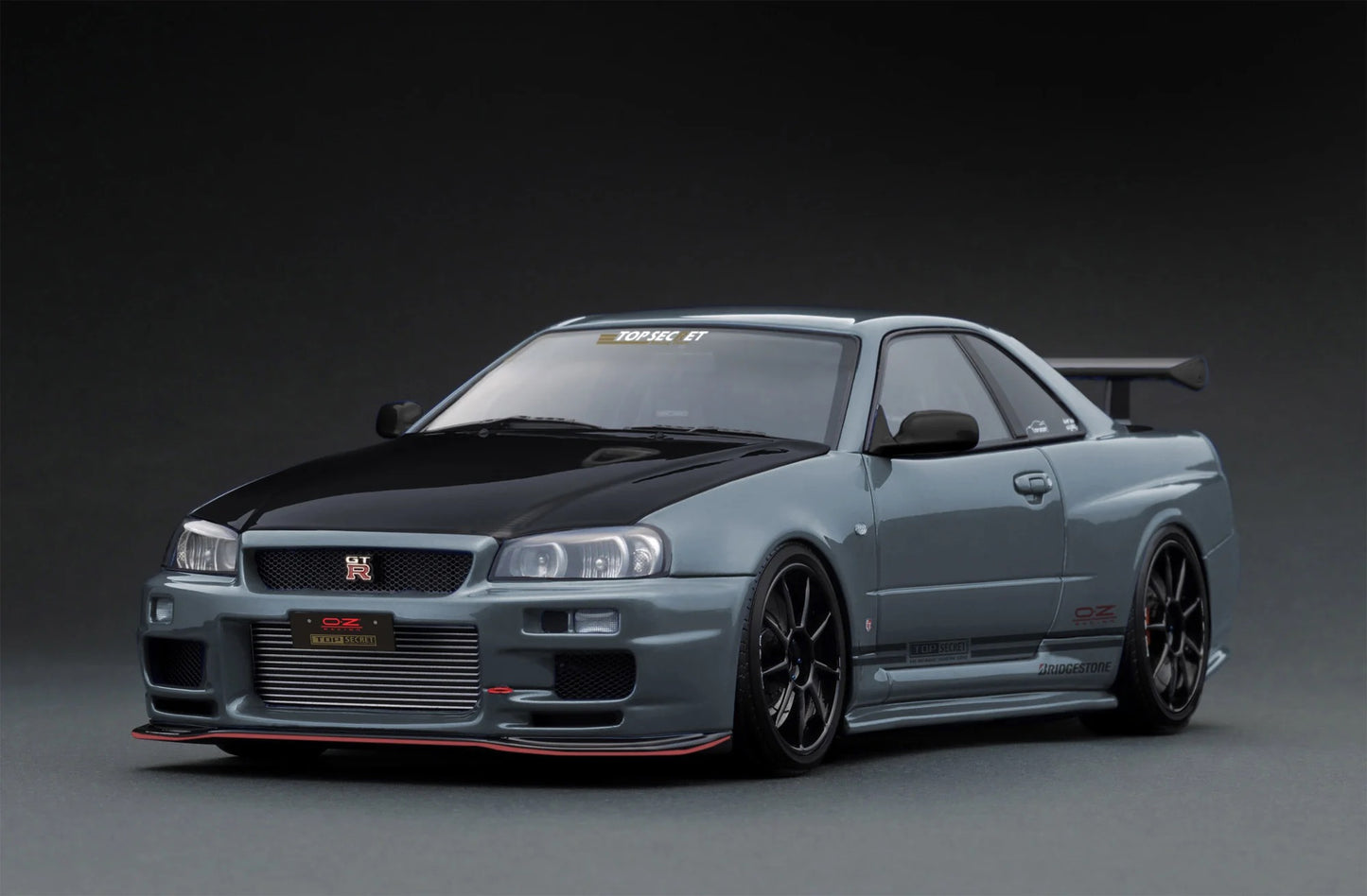 Ignition-Model Nissan Skyline GT-R R34 (BNR34) Top Secret 34GT-R RHD Stealth Grey w/ Carbon Fiber Hood 1:18