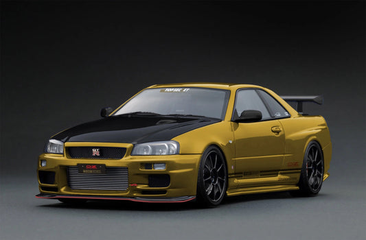 Ignition-Model Nissan Skyline GT-R R34 (BNR34) Top Secret 34GT-R RHD Gold w/ Carbon Fiber Hood 1:18