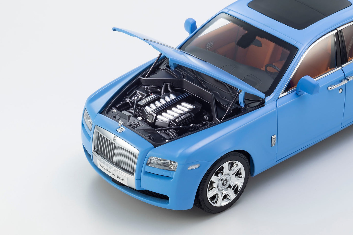 Kyosho 2011 Rolls Royce Ghost Light Blue Matte Effect with Orange Interior 1:18