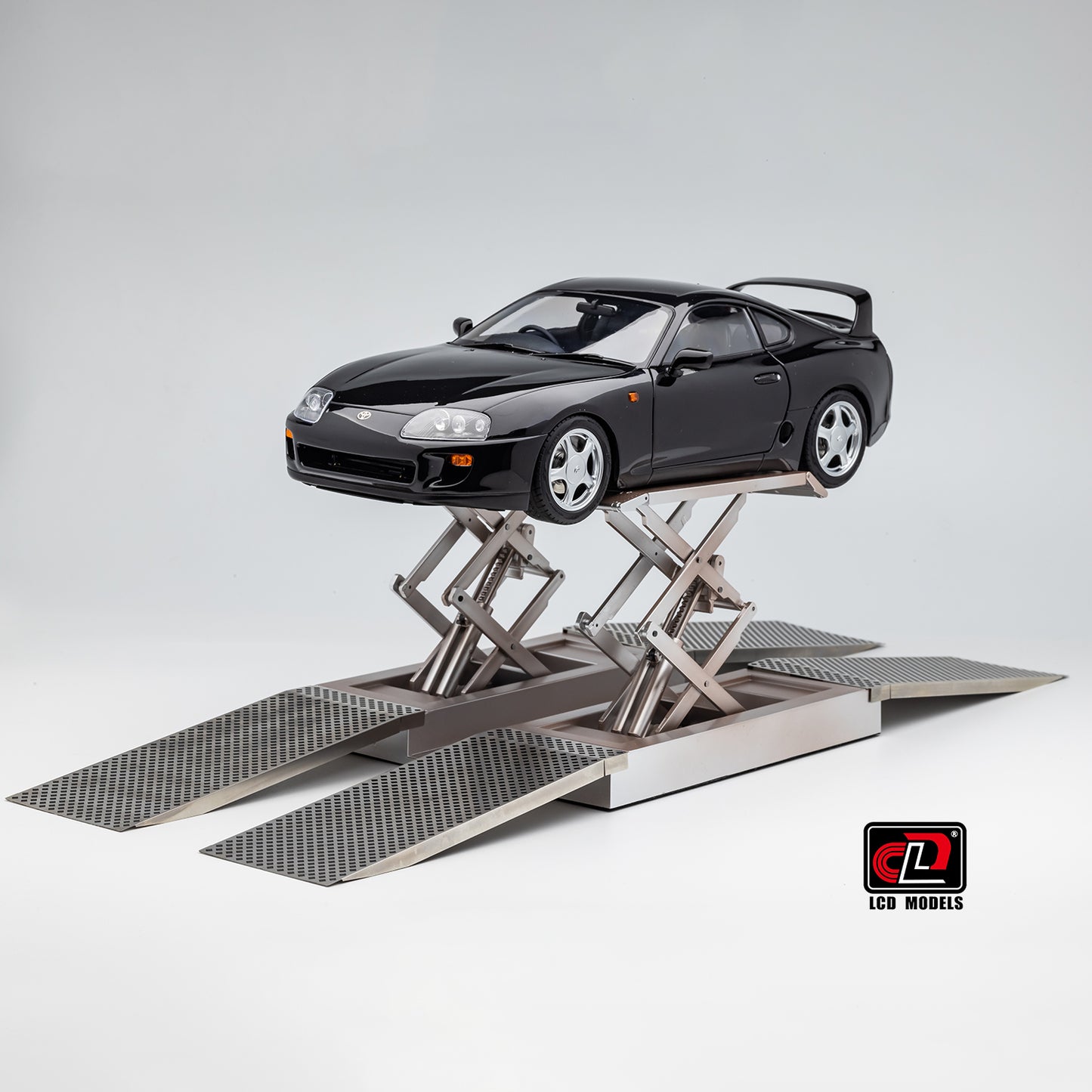 LCD Toyota Supra A80 (Black color) *Comes with a lift!!* 1:18