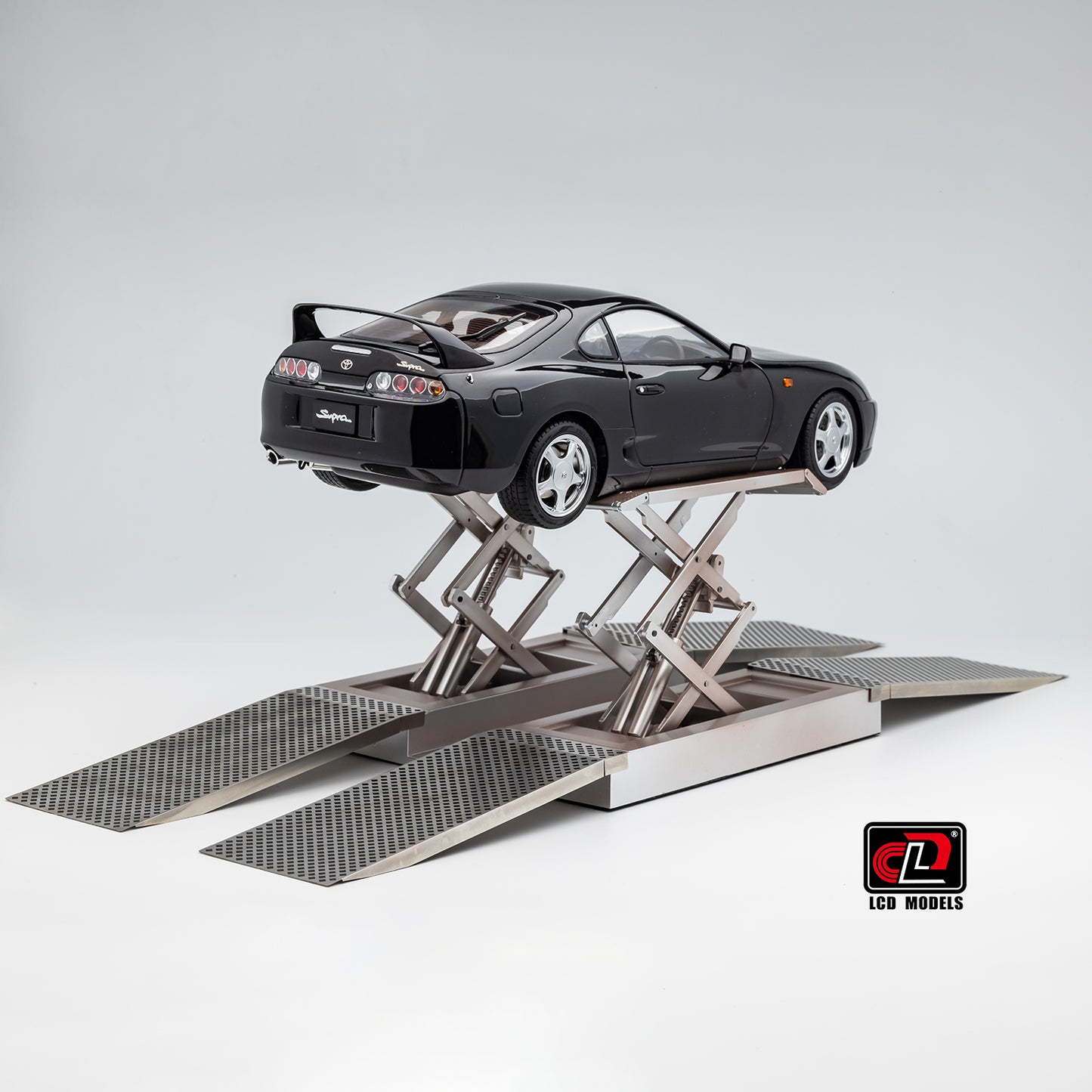 LCD Toyota Supra A80 (Black color) *Comes with a lift!!* 1:18