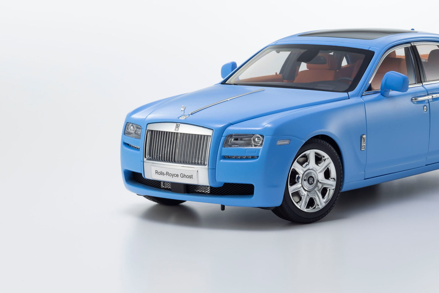 Kyosho 2011 Rolls Royce Ghost Light Blue Matte Effect with Orange Interior 1:18