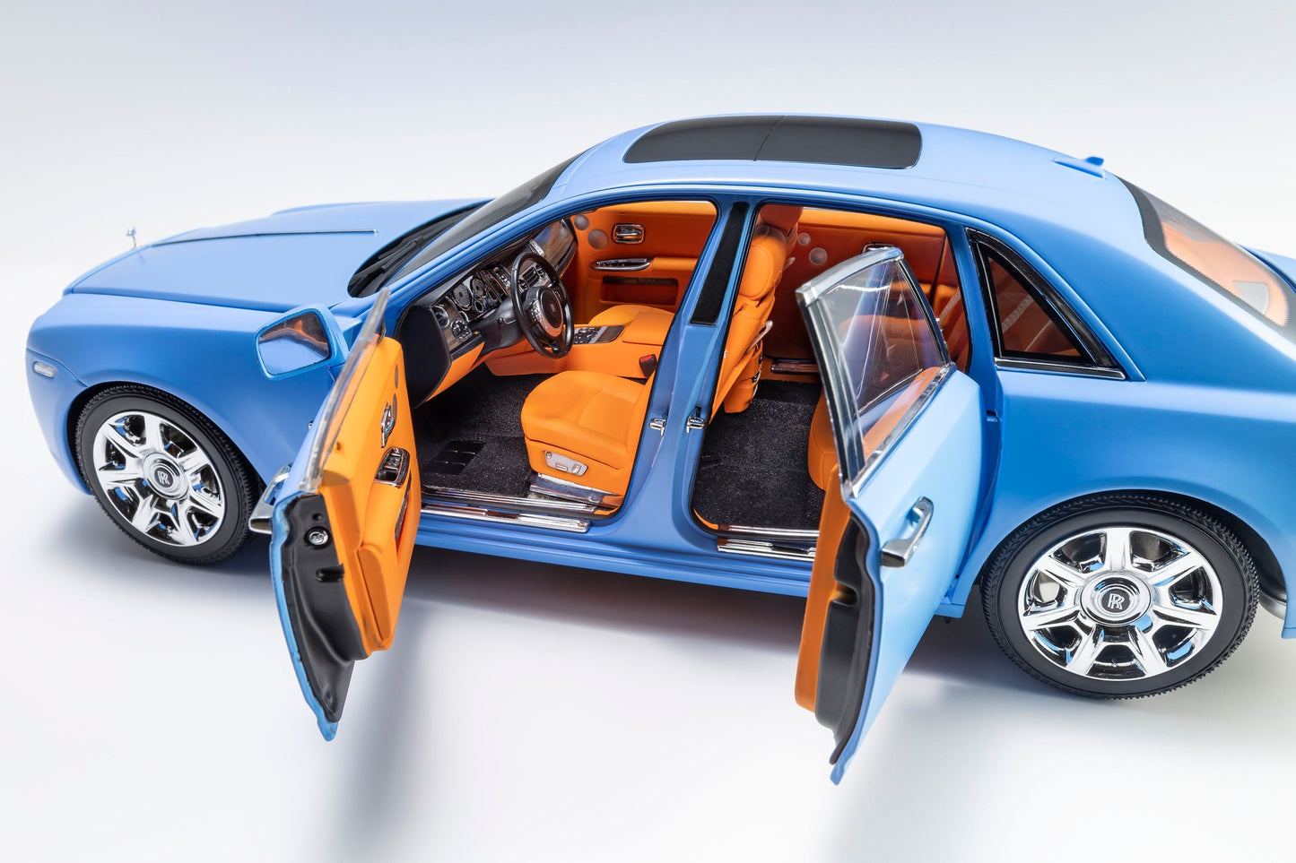 Kyosho 2011 Rolls Royce Ghost Light Blue Matte Effect with Orange Interior 1:18