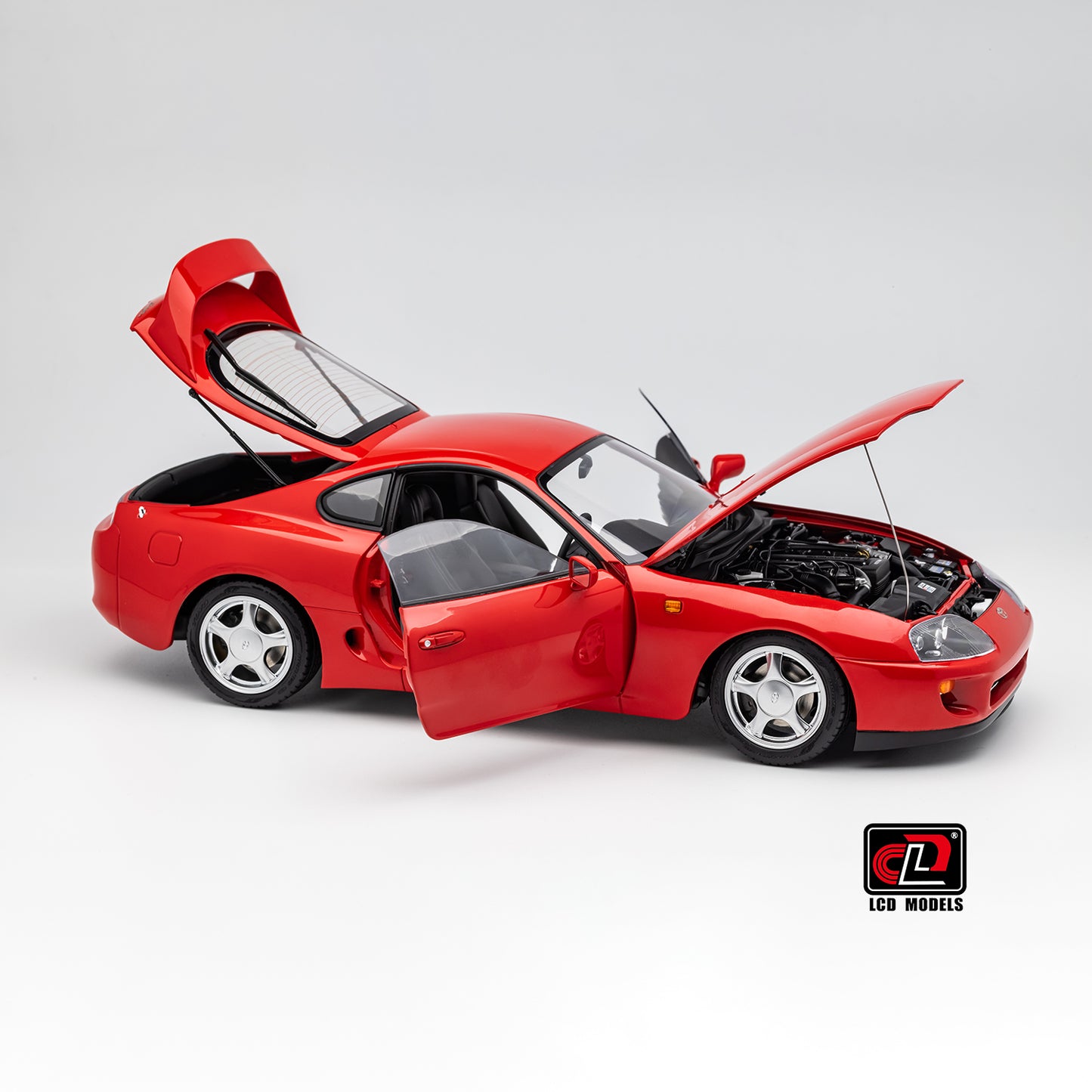 LCD Toyota Supra A80 (Red color) *Comes with a lift!!* 1:18