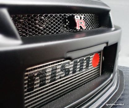 Ignition-Model Nissan Nismo GT-R R34 (BNR34) Z-tune Test 2004 Sazuka RHD Silver and Black 1:18