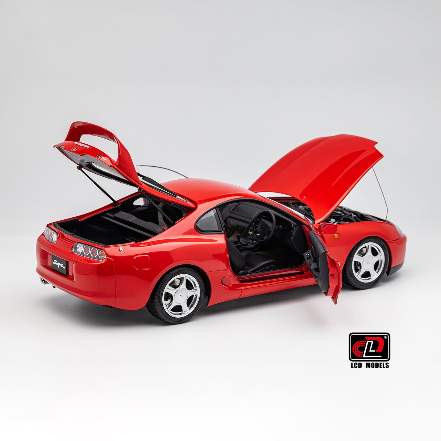 LCD Toyota Supra A80 (Red color) *Comes with a lift!!* 1:18