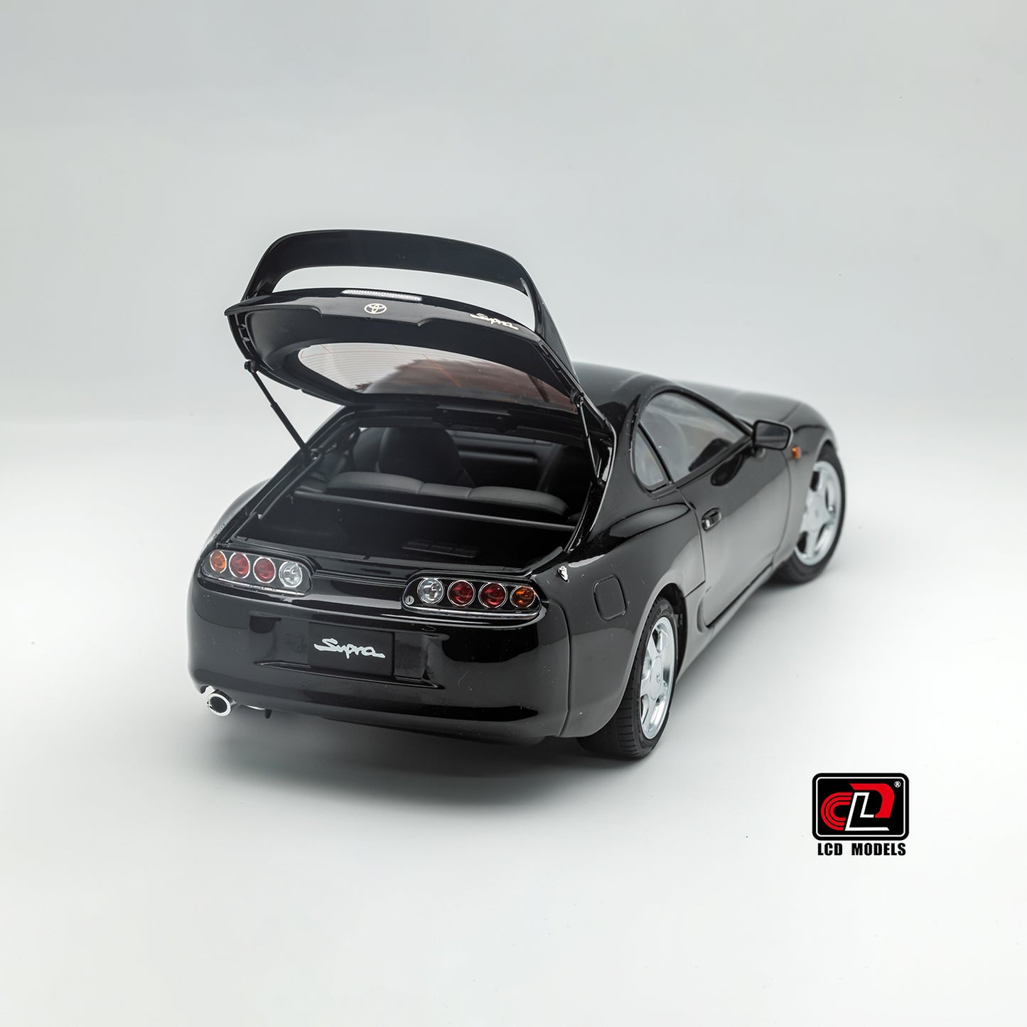 LCD Toyota Supra A80 (Black color) *Comes with a lift!!* 1:18