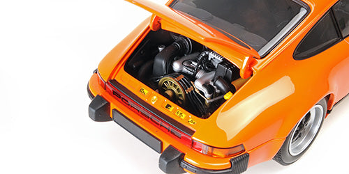 Minichamps 1983 Porsche 911 Carrera 3.2 Coupe G Series Orange 1:18