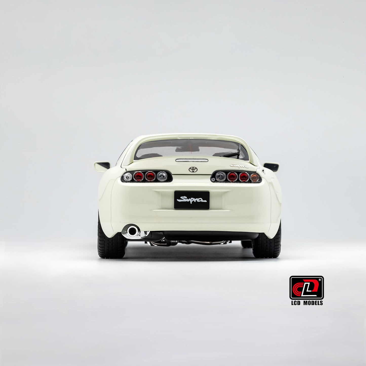 LCD Toyota Supra A80 (White color) *Comes with a lift!!* 1:18