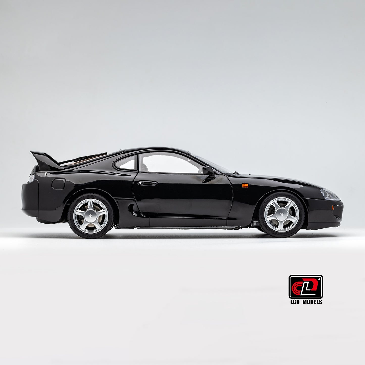 LCD Toyota Supra A80 (Black color) *Comes with a lift!!* 1:18