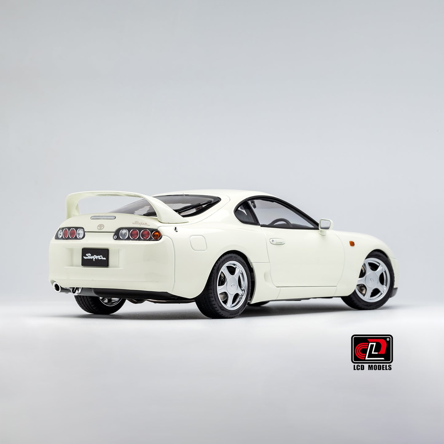 LCD Toyota Supra A80 (White color) *Comes with a lift!!* 1:18