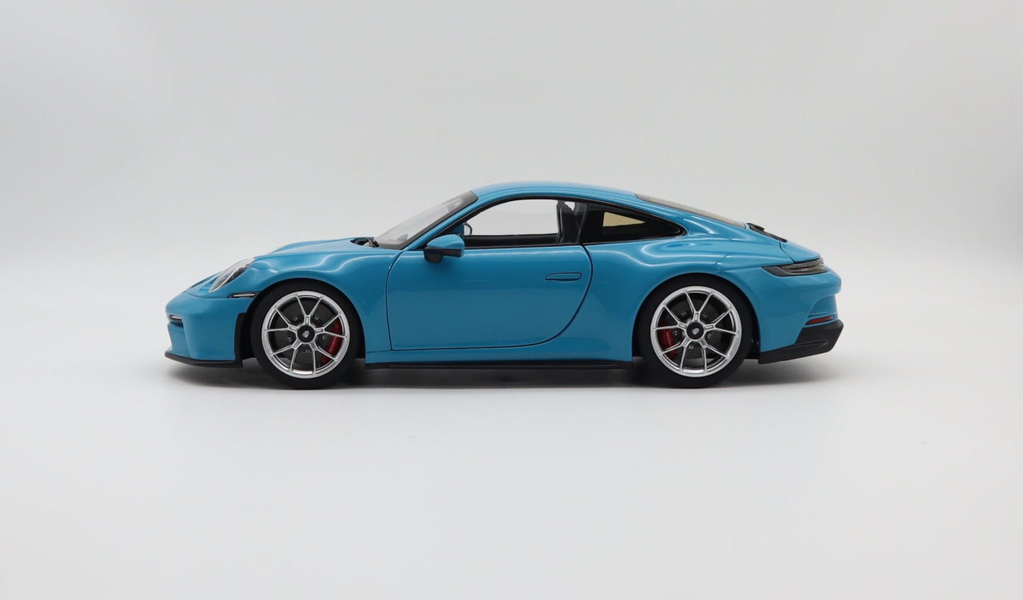 Norev 2021 Porsche 911 992 GT3 Touring Miami Blue w/ Polished Silver Wheels 1:18