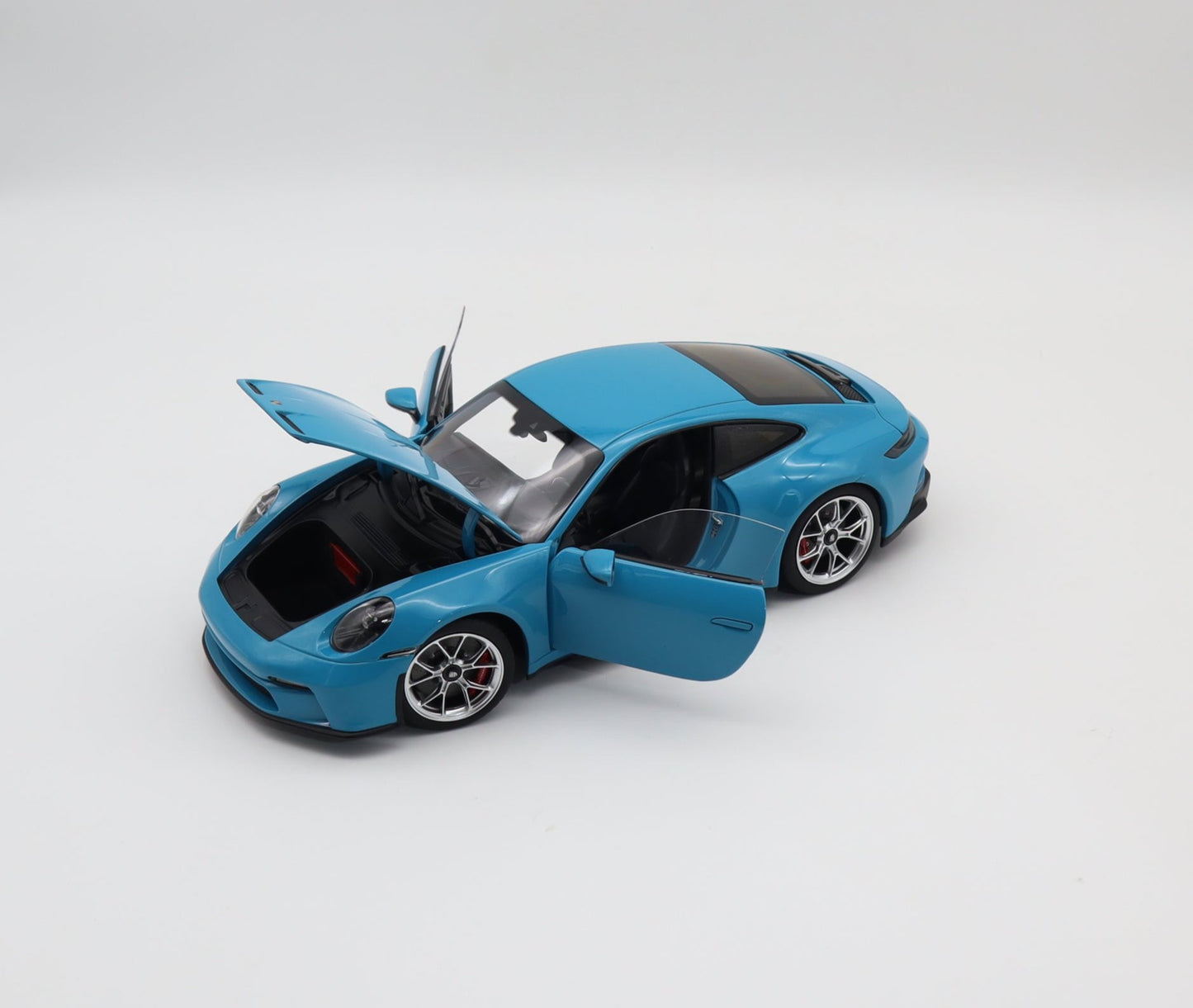 Norev 2021 Porsche 911 992 GT3 Touring Miami Blue w/ Polished Silver Wheels 1:18