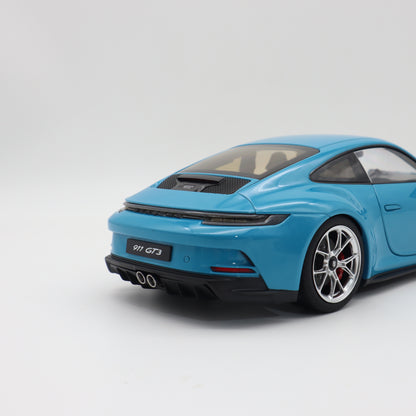 Norev 2021 Porsche 911 992 GT3 Touring Miami Blue w/ Polished Silver Wheels 1:18