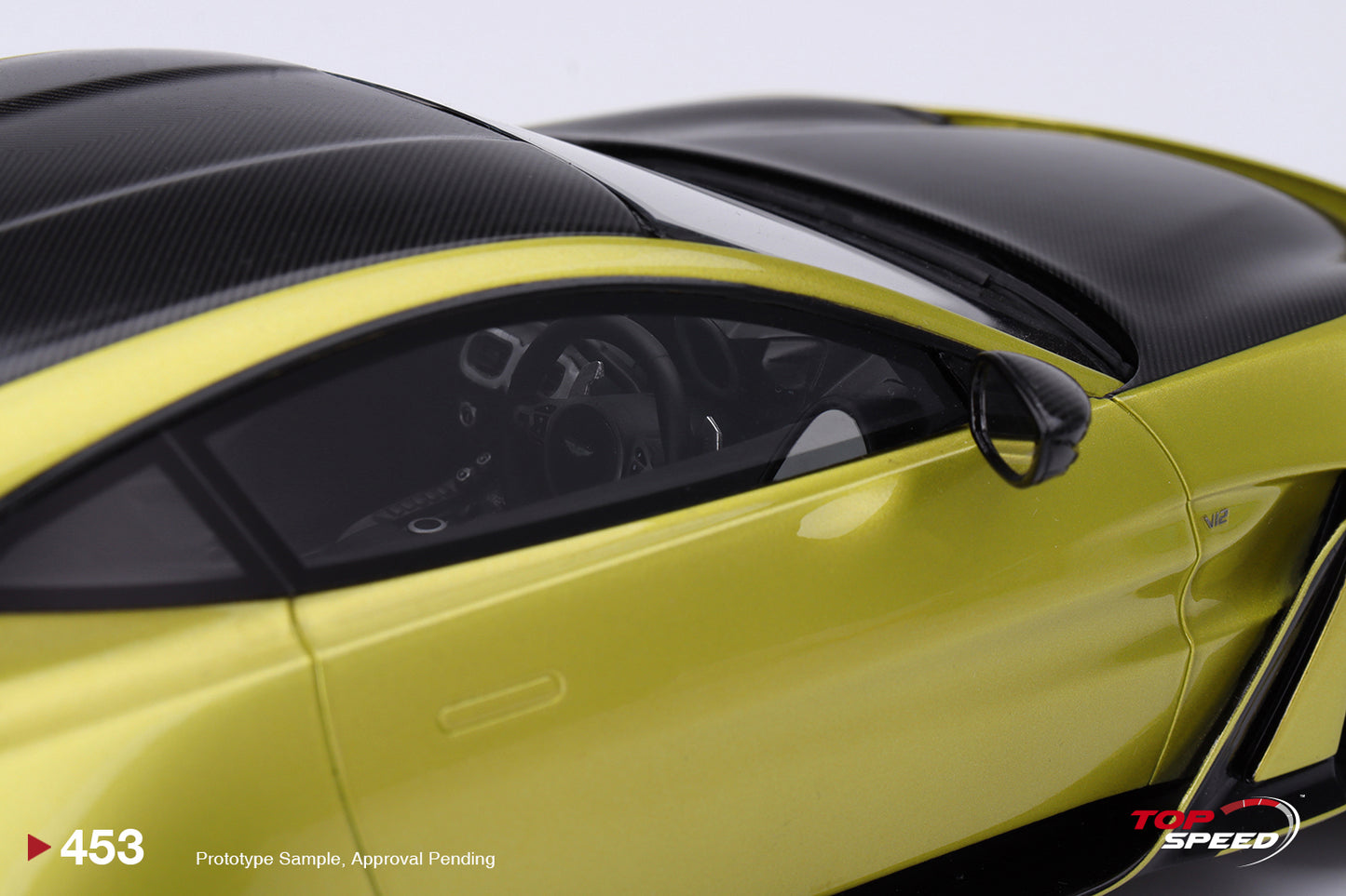 Topspeed Aston Martin V12 Vantage Cosmopolitan Yellow 1:18