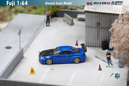 Fuji Nissan Skyline GT-R (R34) Nismo Z-Tune Bayside Blue w/ Carbon Fiber Hood 1:64