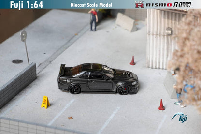 Fuji Nissan Skyline GT-R (R34) Nismo Z-Tune Carbon Black 1:64