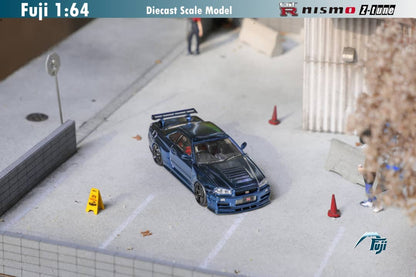 Fuji Nissan Skyline GT-R (R34) Nismo Z-Tune Chrome Carbon Blue 1:64