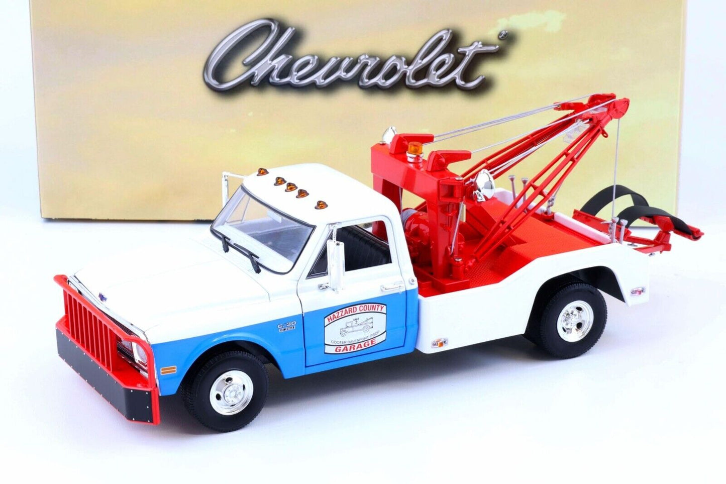 Greenlight 1969 Chevrolet C-30 Dually Wrecker Hazard County Garage White 1:18