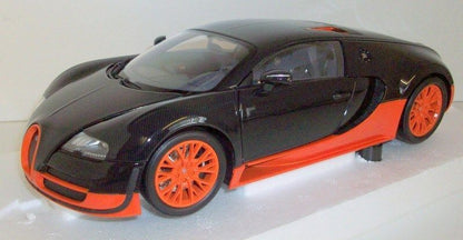 Minichamps 2011 Bugatti Veyron Super Sport World Record Edition Carbon Fiber w/ Orange 1:18